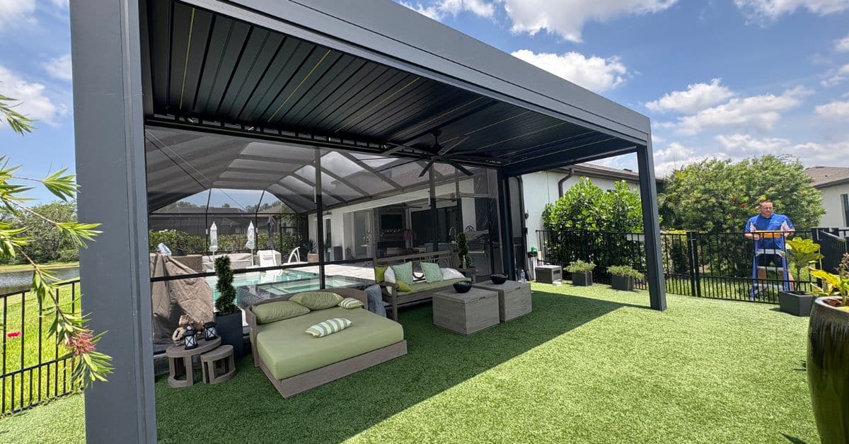 Aluminum pergola installed over outdoor seating area in backyard